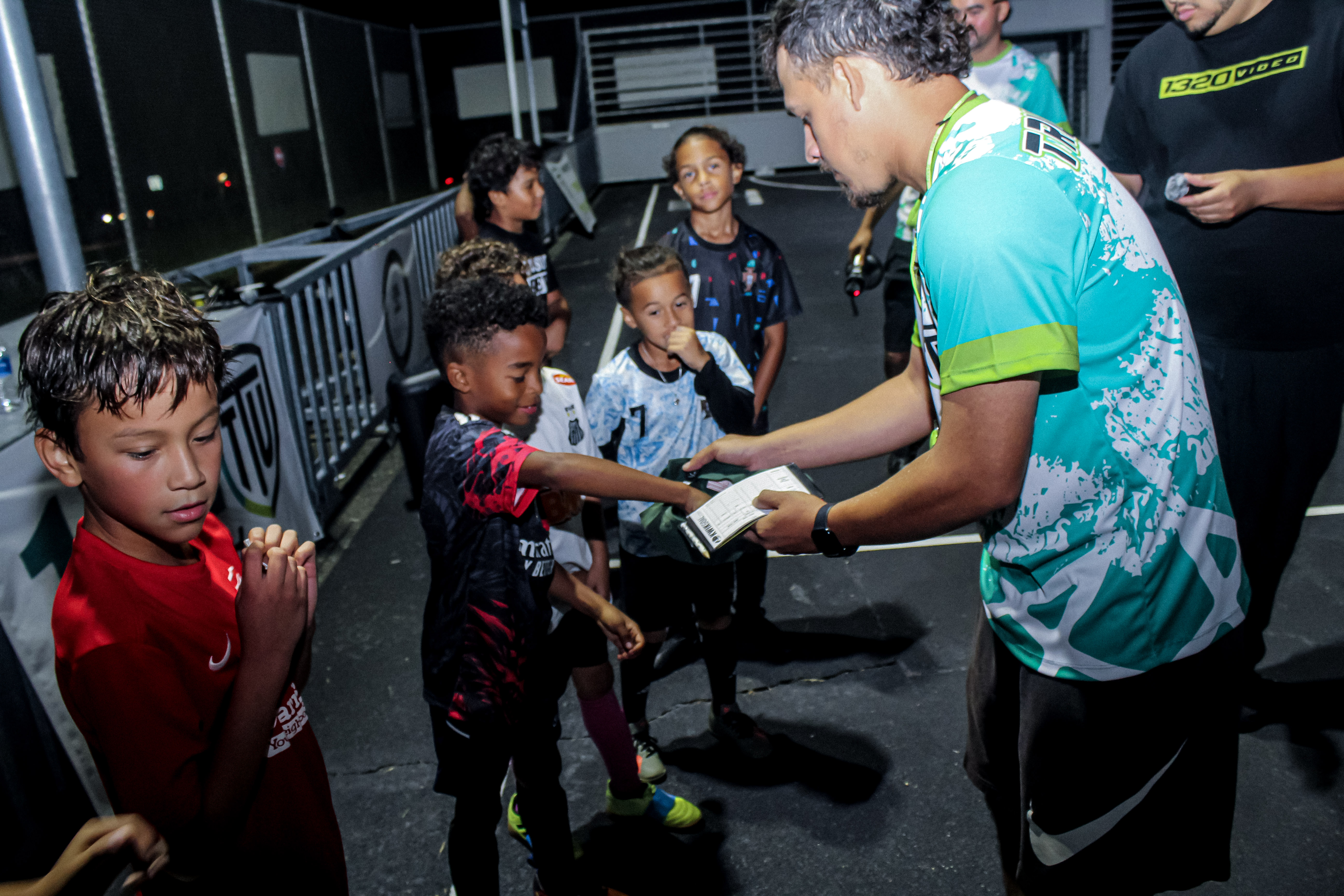 Volunteers setting up mini-goals before training